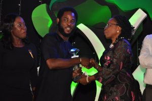 Head of Sponsorship, Airtel Nigeria, Opeyemi Lawal; Vice President, Brands and Advertising, Airtel Nigeria, Enitan Denloye while receiving the award for Campaign of the year from Iquo Ukoh at the ADVAN Awards for Marketing Excellence 2016. 