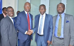 Deputy Managing Director, Stanbic IBTC Bank, Dr. Demola Sogunle; Founder and Executive Chairman, Zinox Technologies Ltd, Mr. Leo Stan-Eke; Chief Executive, Stanbic IBTC Bank, Mr. Yinka Sanni; and Executive Director, Personal and Business Banking, Stanbic IBTC Bank, Mr. Babatunde Macaulay; during the commissioning of Stanbic IBTC Bank’s first digital branch located at Maryland Mall, Lagos on Wednesday, December 14, 2016,