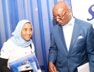 L-R: Executive Director Commercial, NASCON Allied Industries Plc, Fatima Dangote, discussing with another director of the company,  Prof. Chris Ogbechie at the company’s Annual General Meeting (AGM) held recently in Lagos  