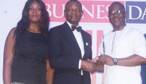 Adetola Fadeyi, Head Wealth Management, United Capital Plc; Frank Aigbogun, Publisher, Presenting the best bank  in support of the real sector trophy to the Usman Isiaka, Head, Strategic Business Unit, Lagos at the BusinessDay Banking Awards, 2017 during the weekend.