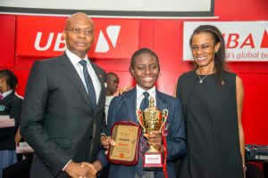  l-r:: GMD/CEO, United Bank for Africa (UBA) Plc, Mr. Kennedy Uzoka; Overall Winner of the 2017 UBA Foundation National Essay Competition and Student of British Nigerian Academy, Miss Samuella Sam-Orlu; and Managing Director/CEO, UBA Foundation, Bola Atta; during the Grand finale and prize giving ceremony of the UBA Foundation National Essay Competition,  held at UBA House in Lagos on Monday