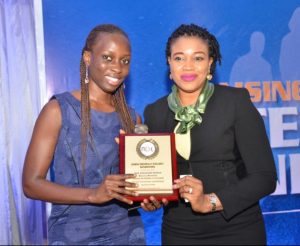 R-L: Mrs. Cynthia Erigbuem, Group Head, Market Intelligence and Analytics of Heritage Bank presenting award to Mrs Afolayan Eniola, during the Generation Next event, titled, “Raising Emotionally Intelligent Generation,” sponsored by Heritage Bank Plc, in Lagos yesterday