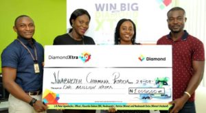 L – R: Peter Ugwoke, Account Officer; Olasunbo Ibekwe, Branch Manager, all of Diamond Bank Plc; Nwabuezeh Patricia, N1million Winner, DiamondXtra Season 10 quarterly draw ; and Nwabuezeh Sixtus, Winner’s Husband during the DiamondXtra Season 10 Quarterly draw prize presentation ceremony held in  Lagos recently.