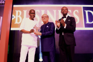 (Left) Yinka Sanni, CEO, Stanbic IBTC Holdings PLC presenting the BusinessDay Lifetime Achievement Award to Haresh Keswani, Group Managing Director, Artee Group (middle) and Mr Frank Aigbogun publisher, BusinessDay newspaper at the BusinessDay Nigerian Business Leadership Awards 2019 at Lagos Continental Hotel over the weekend