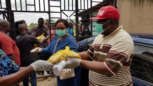 PHOTO CAPTION: Our Daily Manna (ODM) publisher, Bishop (Dr.) Chris Kwakpovwe and wife, Rev. (Mrs) Flora distributing food items to people in Lagos to cushion the effects of COVID-19 lockdown directives, recently.