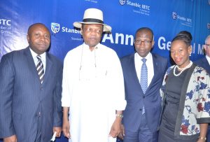R-L: Company Secretary, Stanbic IBTC Holdings PLC, Mr. Chidi Okezie; Chairman, Mr. Atedo Peterside;  Chief Executive, Mr. Yinka Sanni; and Non-Executive Director, Ngozi Edozien; at the 4th  annual general meeting of the company  in Lagos on Tuesday March 7, 2017.