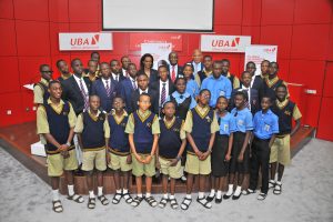 Head, Brand Management, United Bank for Africa, Mr. Toruka Osadunkwu; Director, Marketing and Corporate Relations and Chief Executive Officer, UBA Foundation, Mrs Bola Atta ; Deputy CEO, Anglophone Africa, UBA Plc, Mr Ebele Ogbue; and Group Head,  External Relations, UBA Plc, Mr. Nasir Ramon flanked by students from various schools in Lagos during the Launch of the 2017, UBA Foundation National Essay Competition held at the UBA House in Lagos on Tuesday