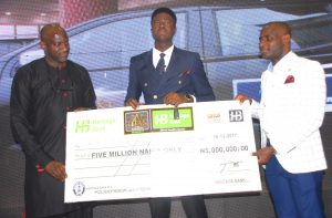 …L-R: Divisional Head, Structured Assets, Heritage Bank, Mr. Kehinde Olugbemi; Winner, The NEXT TITAN NIGERIA Season 4, Mr. Kennedy Iyeh and Divisional Head of Strategy, Heritage Bank Plc, Mr. Segun Akanji, during the star prize presentation of N5 million and a brand-new Ford Ranger to Iyeh, which Heritage Bank was the lead sponsor of the Next Titan Season-4 in Lagos.  