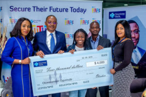 L-R: Divisional Head, Marketing & Corporate Communications, Keystone Bank, Mrs. Omobolanle Osotule, Chief Risk Officer, Keystone Bank, Mr. Tijjani Aliyu, Miss Tomisin Ogunnubi, Mr. Yinka Ogunnubi, Head CSR/Sustainability, Keystone Bank, Ms. Izore Bamawo, at the cheque presentation to Miss Tomisin, the ICT Whizkid, in support of her trip to Yale Young Global Scholars Program for outstanding high school students in USA ...recently.  
