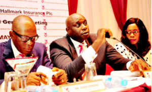 From left: Mr. Eddie Efekoha, Managing Director/CEO; Obinna Ekezie, Chairman; and Rukevwe Falana, Company Secretary, all of Consolidated Hallmark Insurance Plc during the company’s 23rd annual general meeting in Lagos.