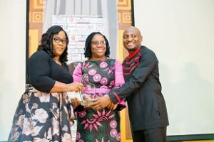 L-R: Head, Human Resources Shared Services, Lafarge Africa Plc, Oluwakemi Akinsinde, presenting an award to Head, Corporate and Transactional Banking, Human Capital Business Partners, Tope Popoola; Head, Learning and Development, Godwin Akpong, both of Stanbic IBTC receiving the award on behalf of Stanbic IBTC during the 2018 Human Resources Practitioners Awards ceremony held in Lagos recently…