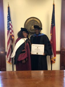 L-R: Her Excellency Rev. Dr. Jacqueline Mohair, Dr. Obeahon Ohiwerei, GMD/CEO  of Keystone Bank Limited as he is conferred with a  Honourary Doctorate Degree from Trinity International University, Georgia in recognition of his sterling achievements