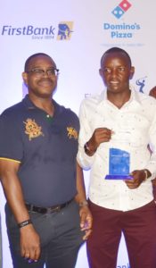 Gbenga Shobo, Deputy Managing Director, First Bank of Nigeria Limited with Samuel Njoroge, Winner of the 57th FirstBank Lagos Amateur Open Golf Championship held in 2018.
