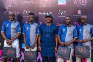 Idowu Thompson, Group Head, Private Banking, First Bank of Nigeria Limited (middle) with some players at the 2019 Fifth Chukker Polo championship held in Kaduna.