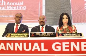 Chairman, Zenith Bank Plc, Mr Jim Ovia (Centre) flanked by the Group Managing Director/ CEO, Mr. Ebenezer Onyeagwu (Left) and the Deputy Managing Director, Dr. Adaora Umeoji (Right) at the 29th Annual General Meeting of the bank held at the Shehu Musa Yaradua Centre, Abuja on Monday, March 16, 2020.